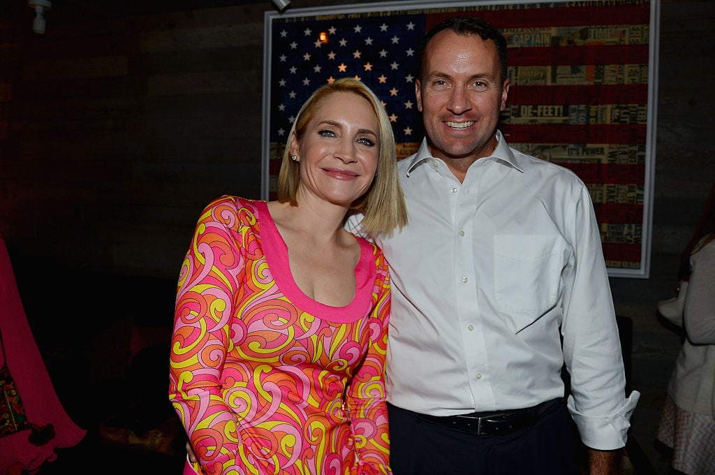 Andrea Canning posing with husband Tony Bancroft at event