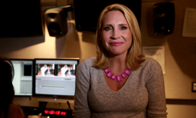 Andrea Canning in front of monitors during news editing
